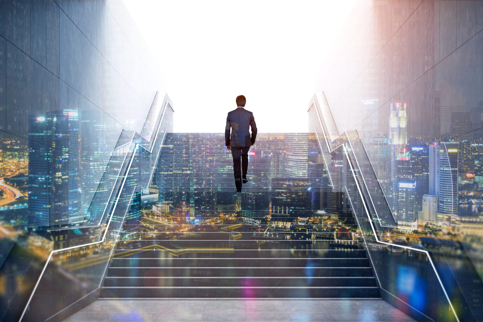 Rear view of a businessman climbing stairs to get to a large city center.