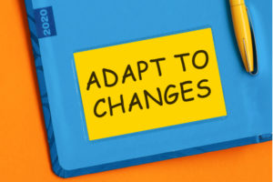 A Notebook that says adapt to changes